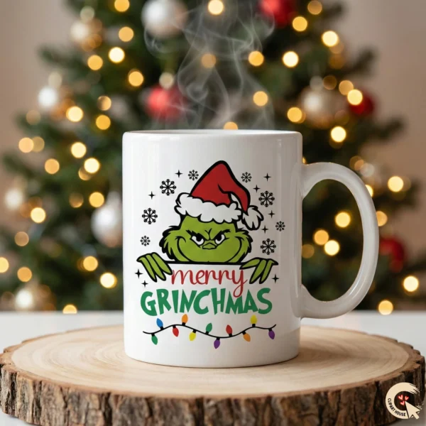 Classic Peeking Grinch Merry Grinchmas SVG design printed on a white ceramic coffee mug with Christmas tree background.