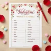Printable Valentine Word Scramble game sheet on wooden table with red pen and candy hearts props.