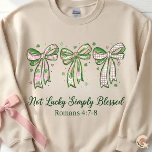 Not Lucky Simply Blessed sweatshirt with pink and green coquette bows and Romans 4:7-8 scripture.