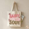 Eco-friendly canvas tote bag mockup featuring Sassy Little Soul leopard print design.
