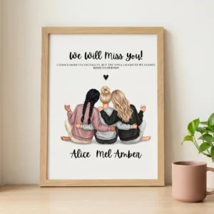 Framed editable coworker leaving gift friendship print on a modern desk with a plant and pink mug.