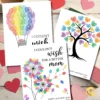 A creative flat lay showing three Mother's Day cards (Balloon, Tree, Dandelion) fanned out on a white wooden table with heart confetti and green ink pads.